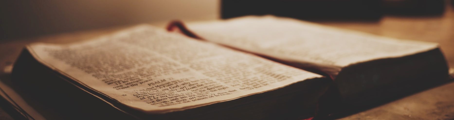photo of a bible on a desk